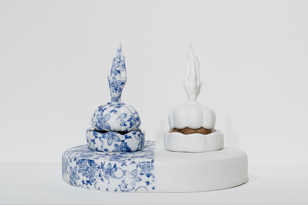 <em>Half</em>, 2014. Jingdezhen porcelain, blue and white pattern transfer, human hair, dimensions 10 × 8 × 6 inches. Collection of Museum of Fine Arts, Houston.