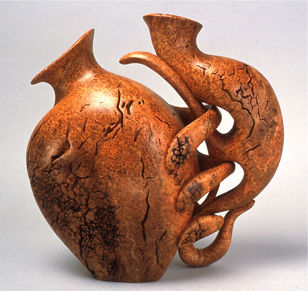 <em>Duet Vase</em> by Michelle Holzapfel, 2001. Two linked vessels carved from a single cherry burl, 12 × 12 × 6 inches.