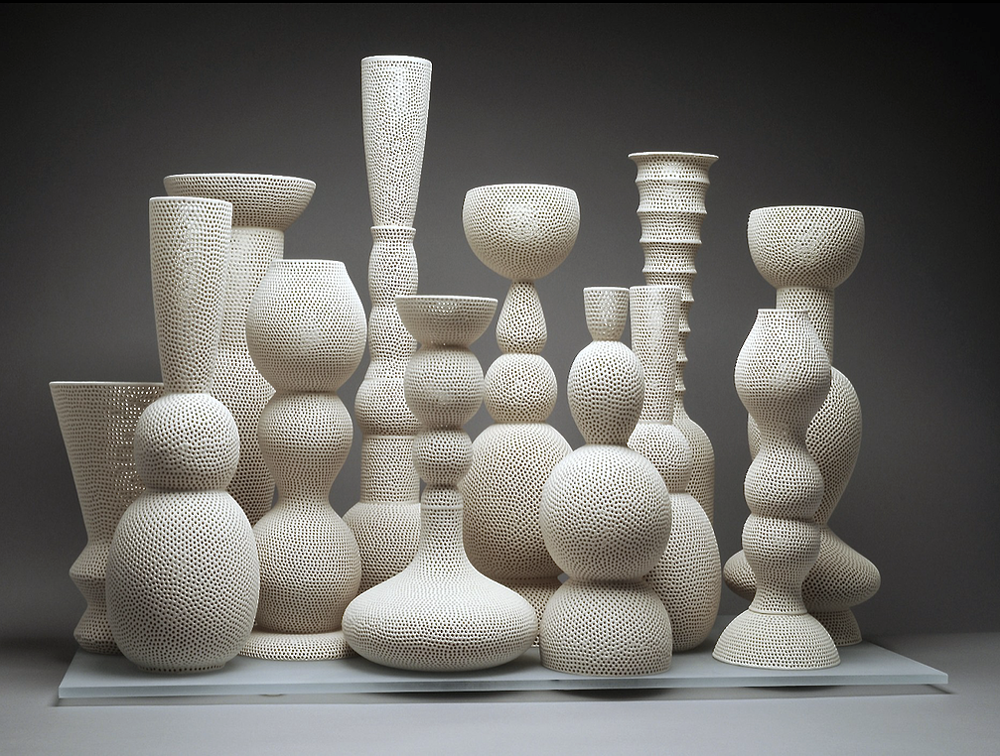 Perforated Totem Cluster, earthenware and glaze, 36 x 23 x 28 inches, 2007-2008.