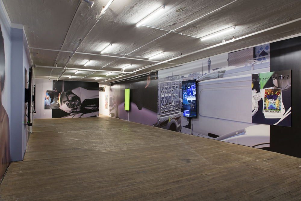<em>Big Surprise</em>, 2019. Interactive AI website for 4 monitors, scaleable wallpaper, digital prints on laser-cut acrylic, dimensions variable. Bridget Donahue Gallery, New York City.