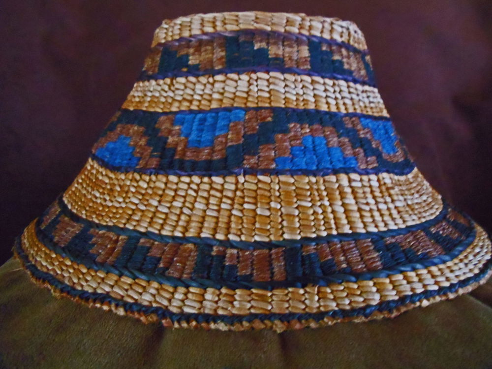 <em>Bear Track & Hood of Raven Hat</em>, 2013. Red and yellow cedar and waxed Irish linen, dimensions: 39 inch circumference and 12 inch diameter at the base; top of the hat has a 16.25 inch circumference with a 4.5 inch diameter, it stands 6 inches high.