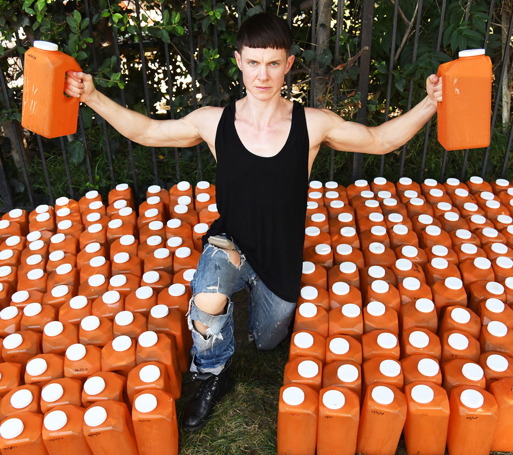 200 Days, 200 Gallons, durational performance featuring the artist in front of 200 gallons of piss collected from their body since the president rescinded the Obama era ordinance allowing trans teens to urinate in their bathroom of choice, 2017. Photo by Robyn Beck.