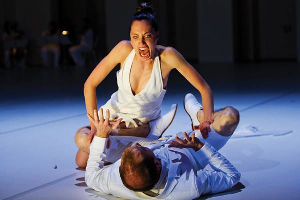 Photo of dancers performing choreography by John Jasperse.