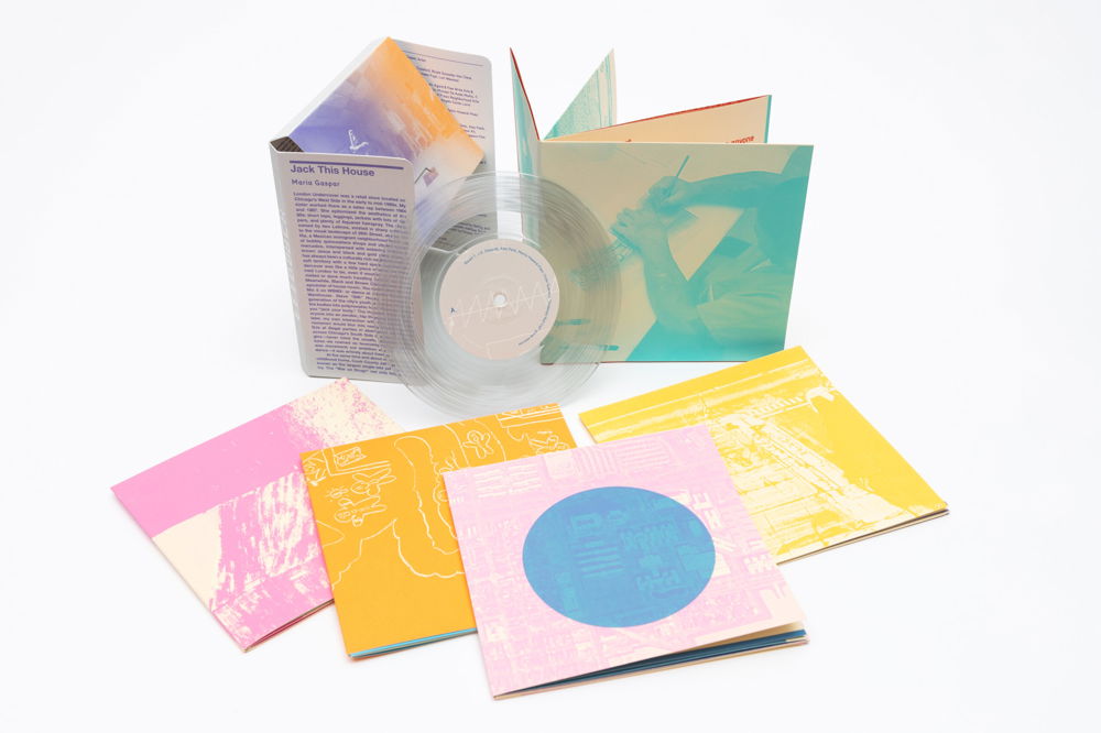 Square booklets and a transparent CD on display against a white background. The booklets feature a range of pink, yellow, and teal imagery.