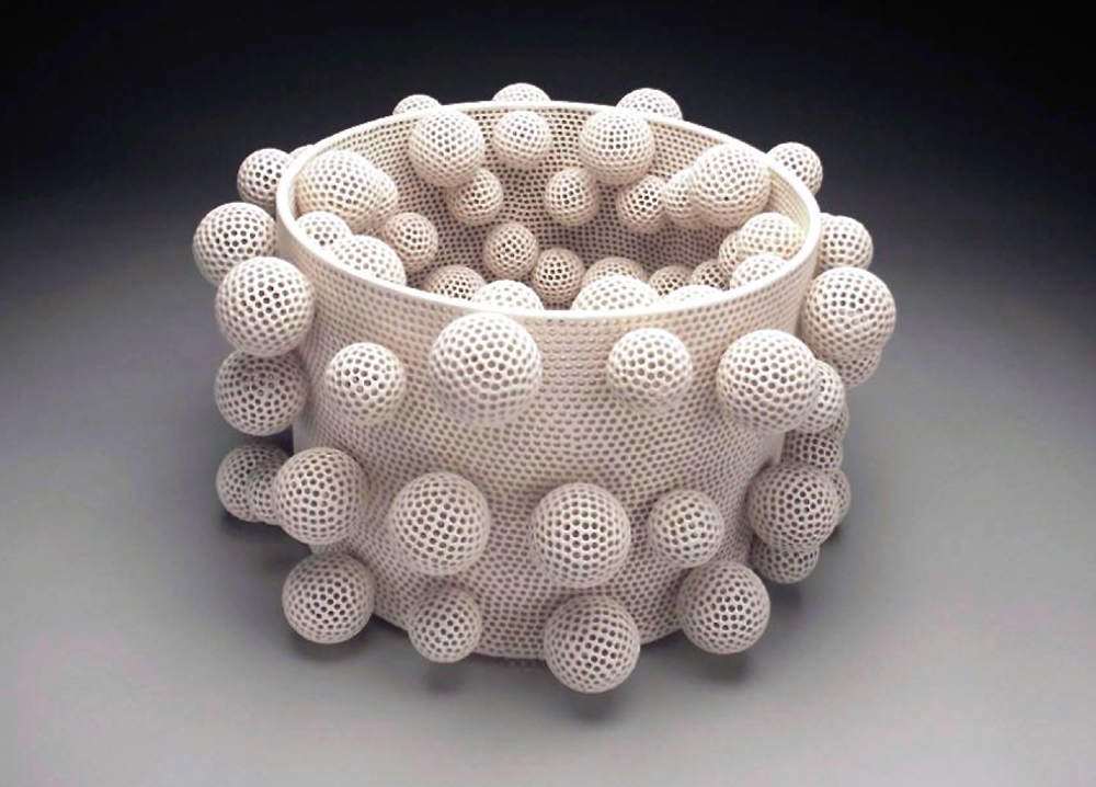 Perforated Vessel with Attachments, earthenware and glaze, 12 x 20 inches, 2008.