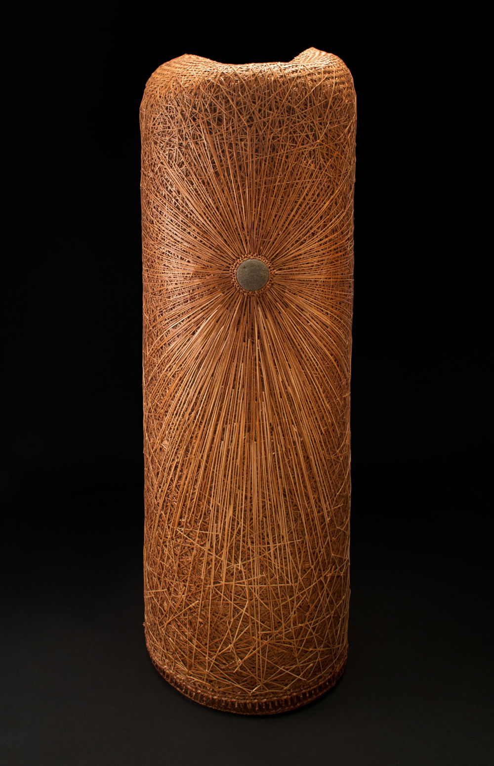 Radiate, basketry, cedar bark, cedar roots, 52 x 14 inches, 2013.