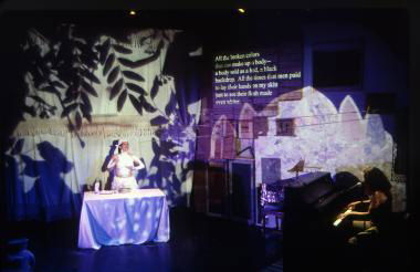 Photo of performance of play with set design by Julie Archer.