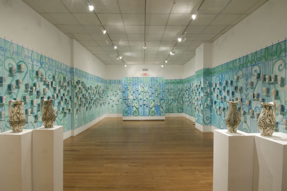 Audubon Bird Exhibition: 1400 cups illustrated with North American birds on the surface and bird call motion sensors.