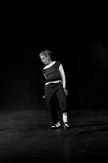 Photo of dancer performing choreography by Deborah Hay.