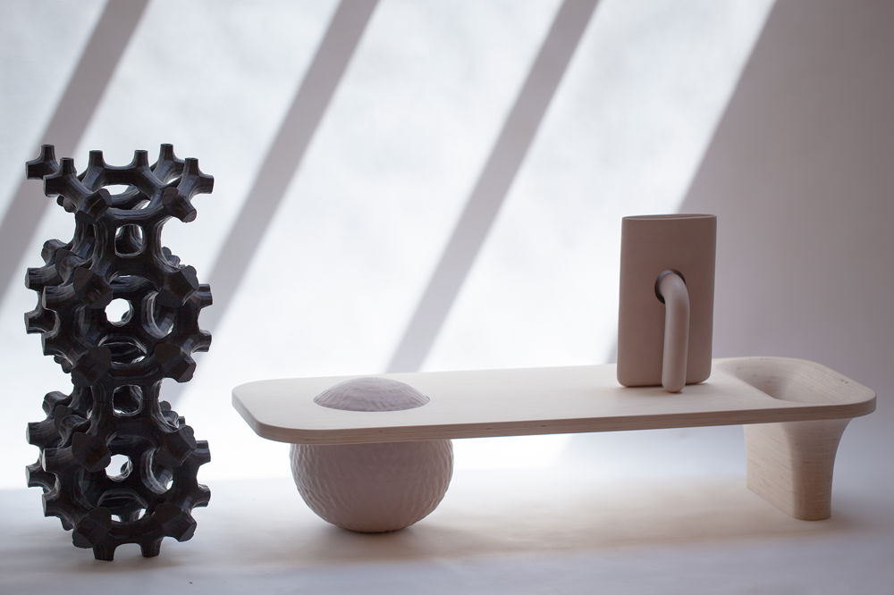 <em>Table, Vase, Plant</em>, 2018. Ceramic, maple plywood, dimensions 60 × 24 × 12 inches.