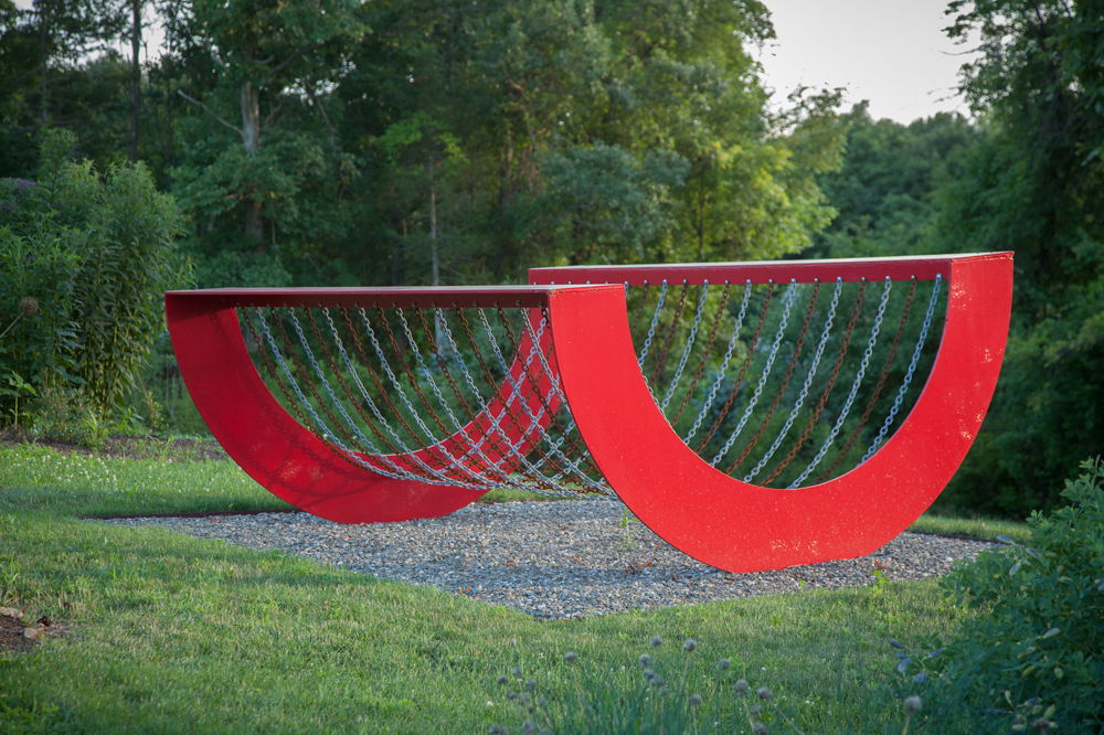 <em>Homage to Coco</em>, 1970. Painted steel and chain, dimensions 48 × 96 × 120 inches.