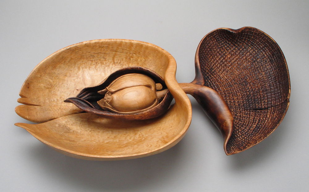 <em>Pomona’s Spoon</em> by Michelle Holzapfel, 2009. Wood, surfaces textured with pyrography and scorching, 4 × 13 × 22 inches.