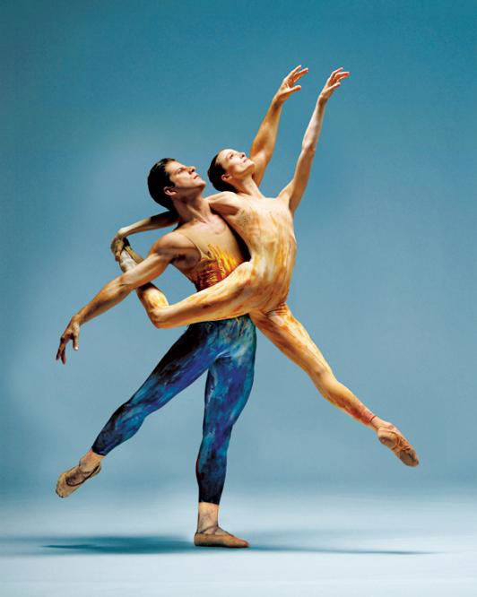 Photo of dancers performing choreography by Lar Lubovitch.