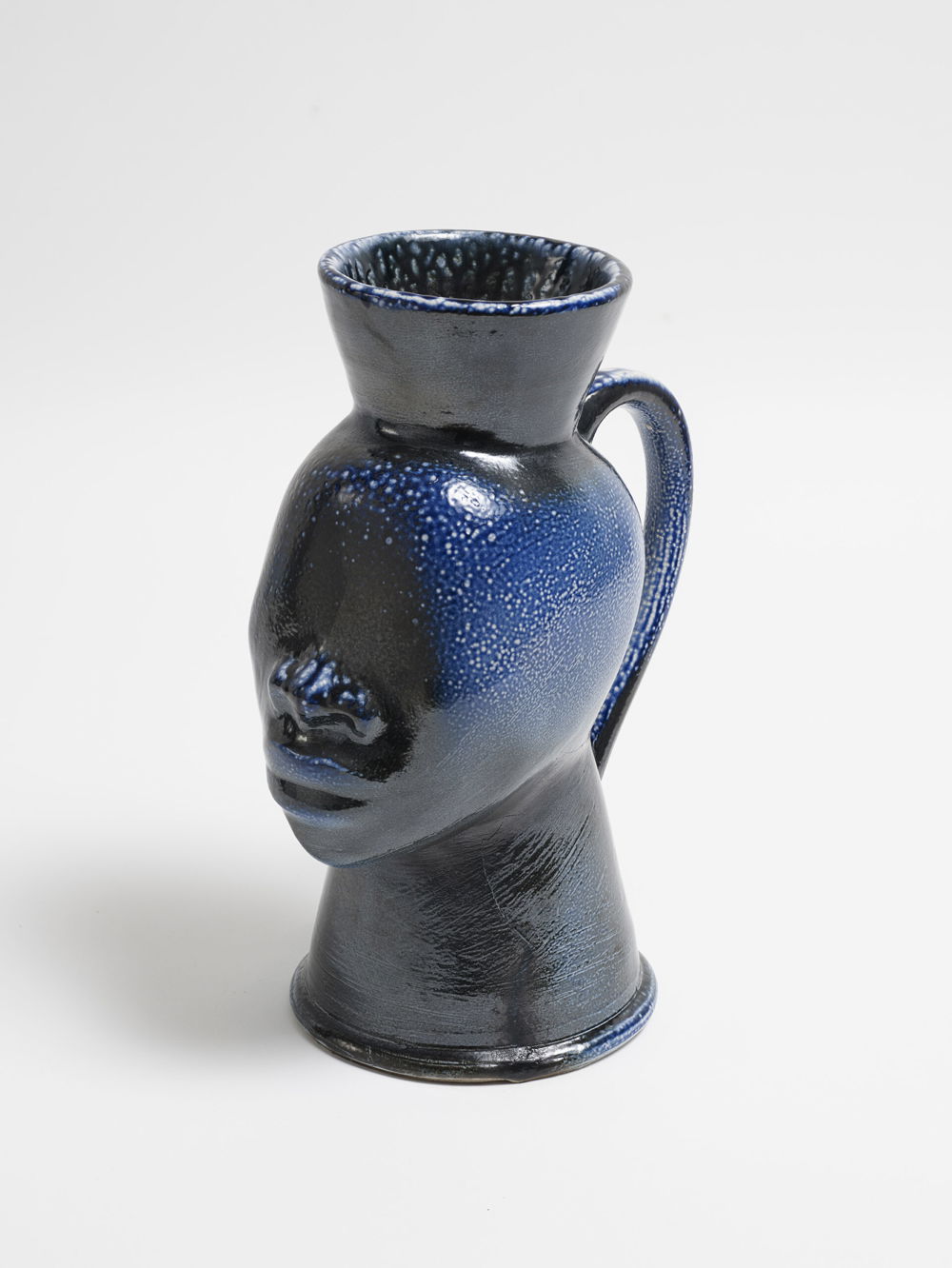<em>Head with Cobalt</em>, 2018. Salt-fired porcelain, 15 x 7 x 11 3/4 inches.