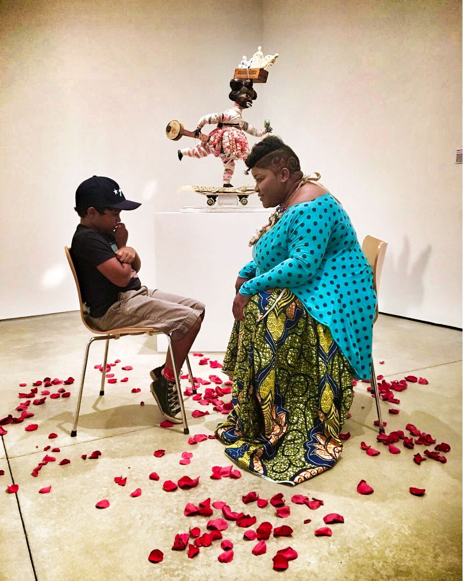 i love you this much, performance: one-on-one poem making and performance on rose petals, love is the reason, Virginia Art Center, 2016.